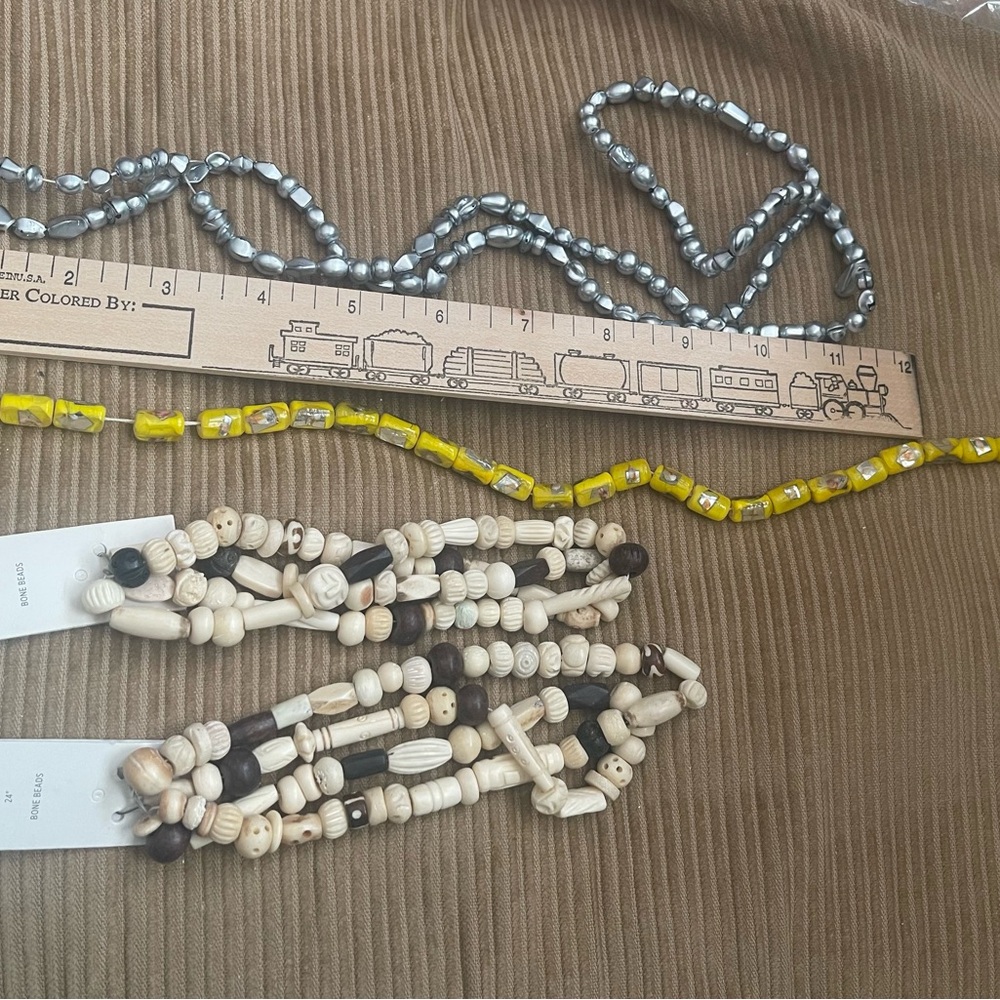 4  STRANDS OF BEADS